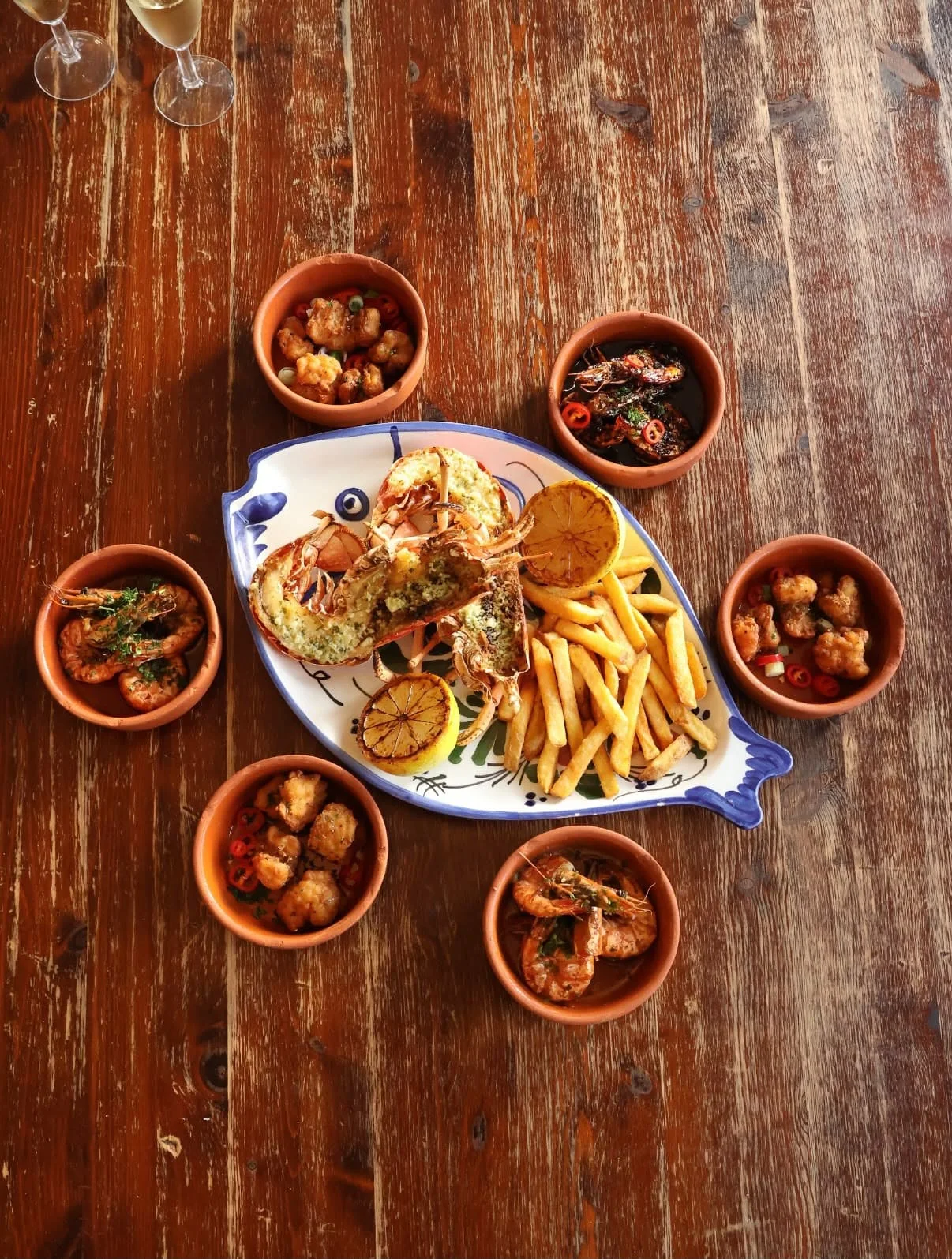 A generous spread of West Mersea seafood served on a wooden table