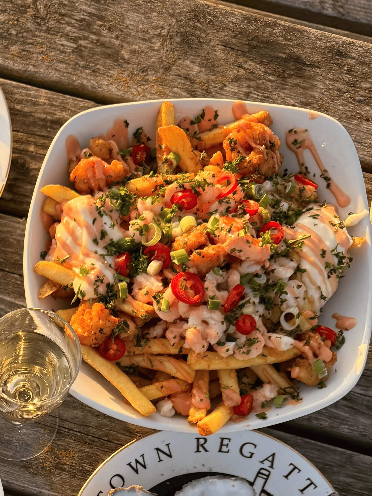 Loaded chips topped with prawns, calamari, chilli, herbs and seafood sauce